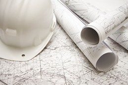 picture of hard hat and maps